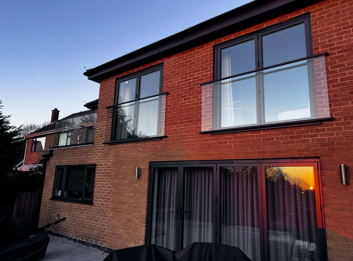 Glass Juliet balcony installed on a modern house